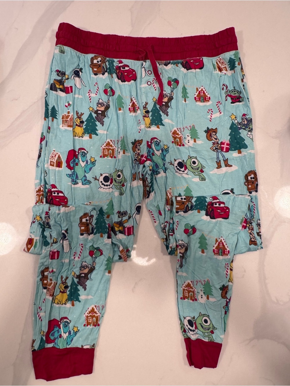 Little sleepies, women’s pajama pants, size medium, Pixar Christmas print